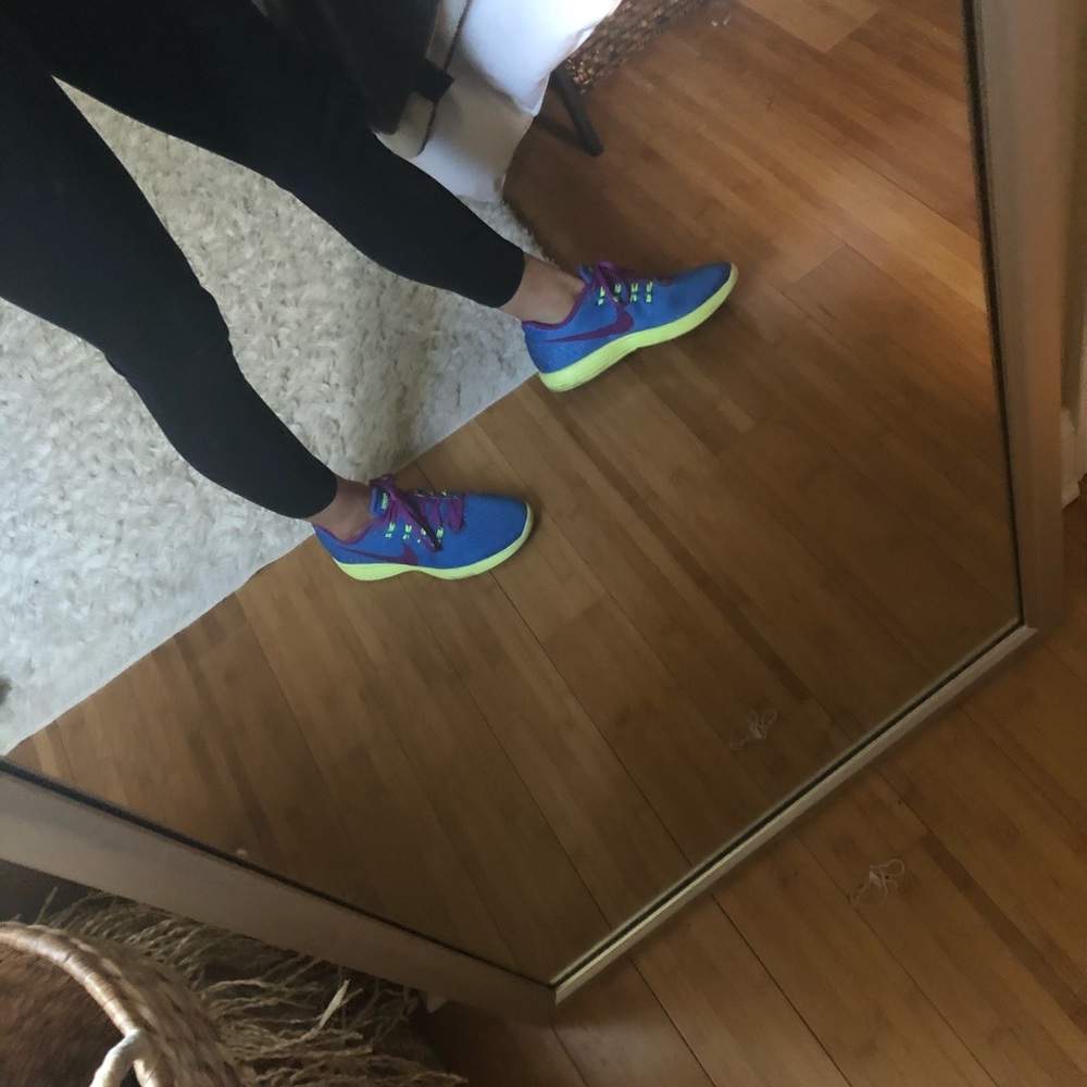 Blue nike athletic shoes
